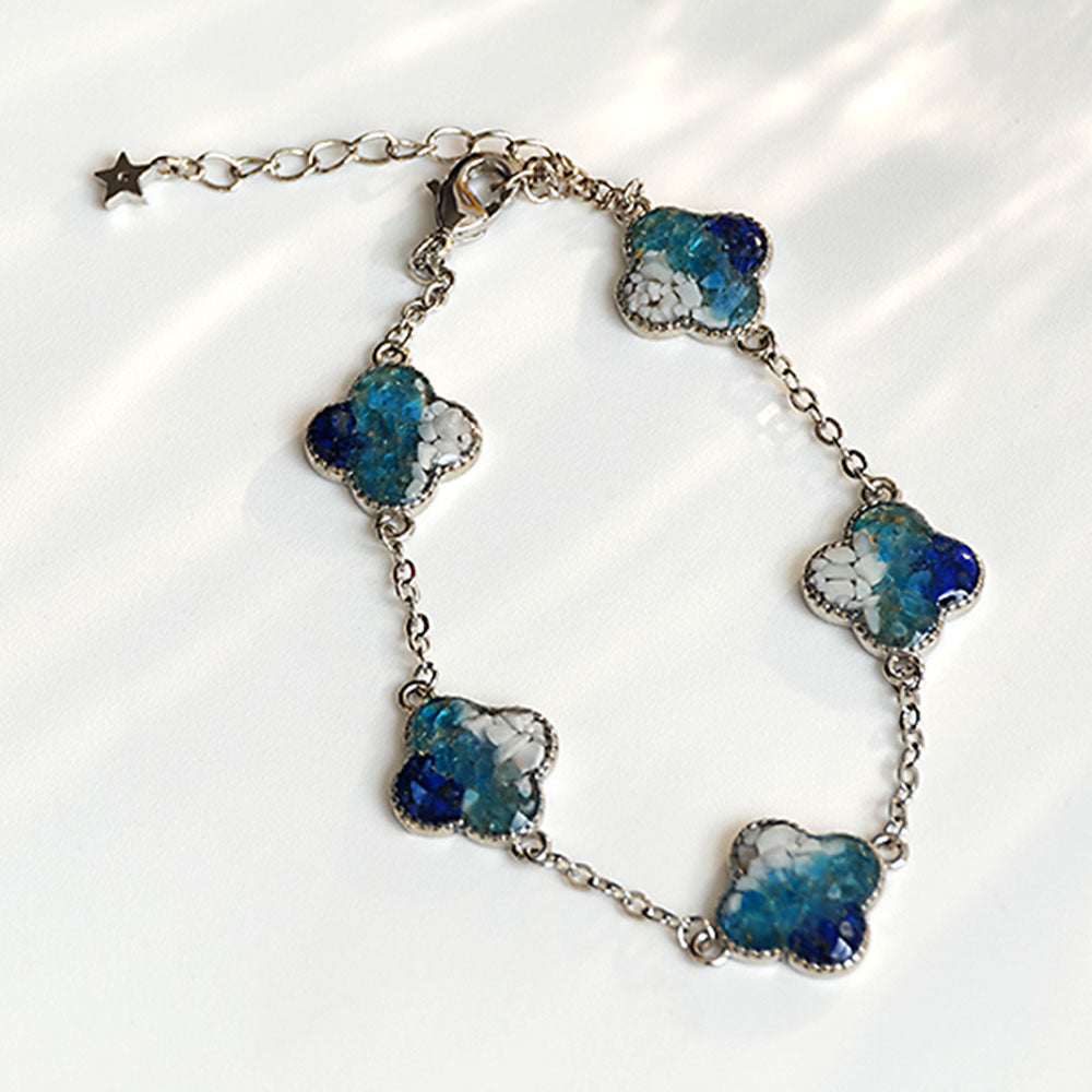 Silver Four-Leaf Clover Bracelet – Blue & White