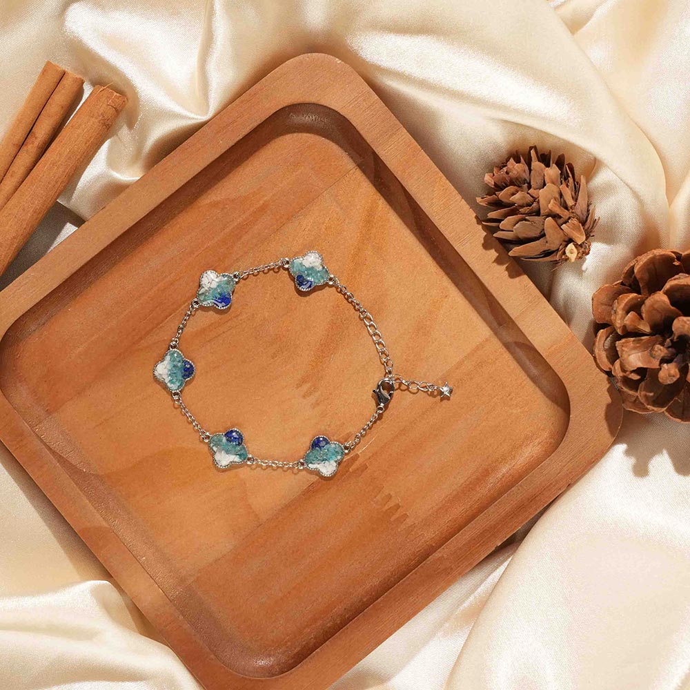 Silver Four-Leaf Clover Bracelet – Blue & White