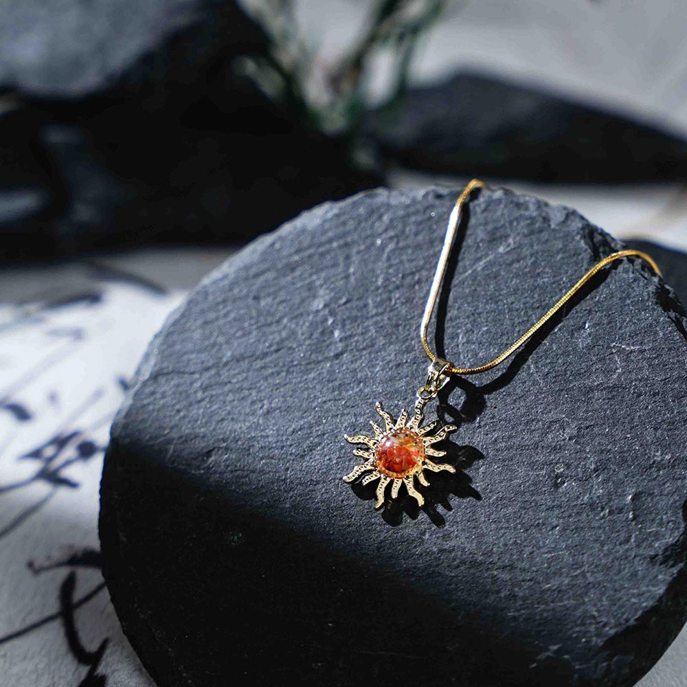 How to Style a Red Crystal Sunburst Pendant Necklace