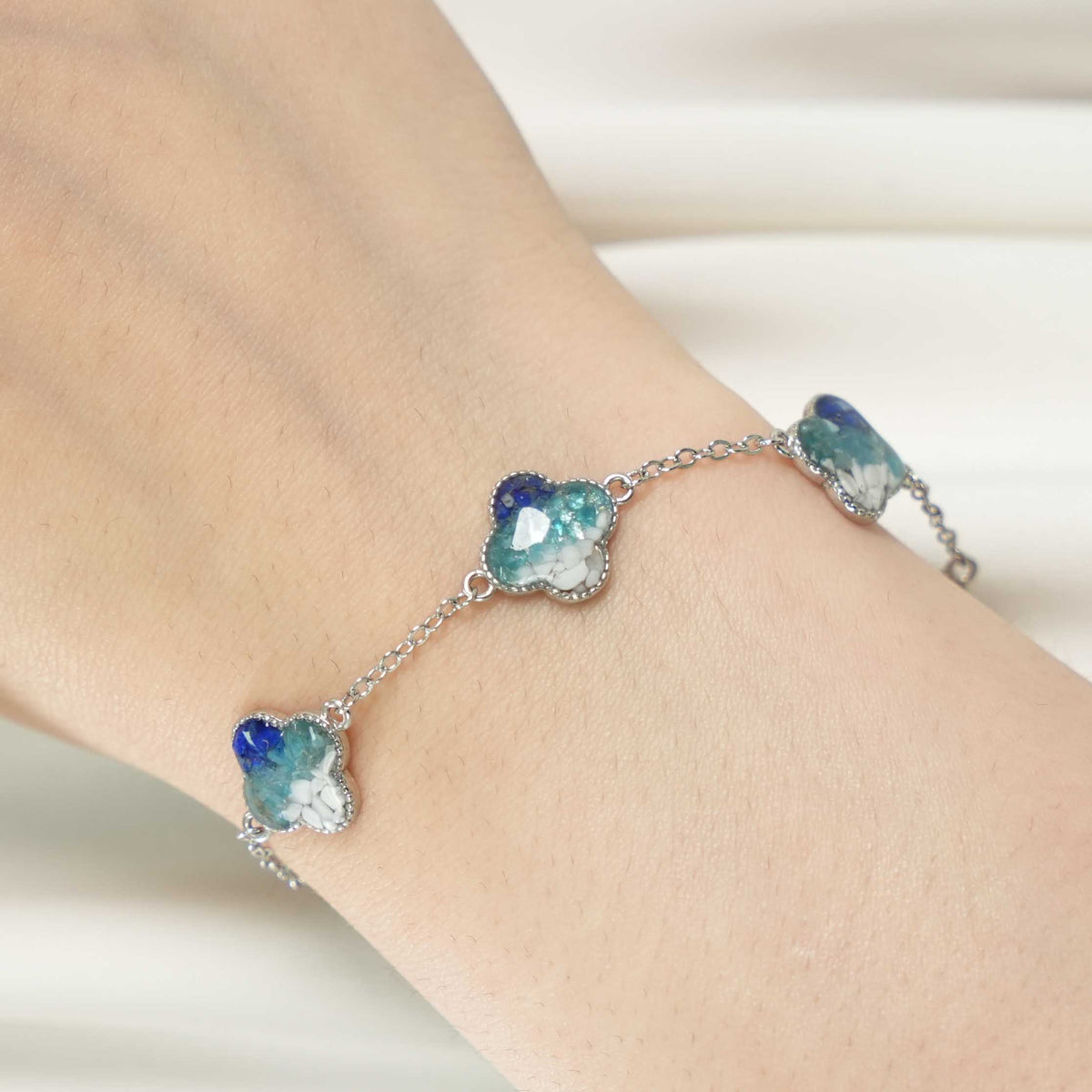 Silver Four-Leaf Clover Bracelet – Blue & White