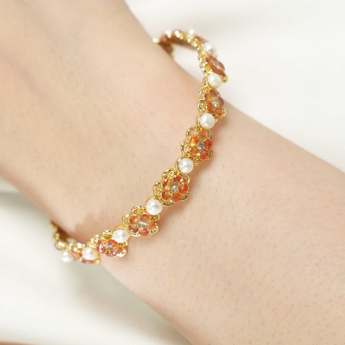 Pearl Bracelet with Peach Blossom Design