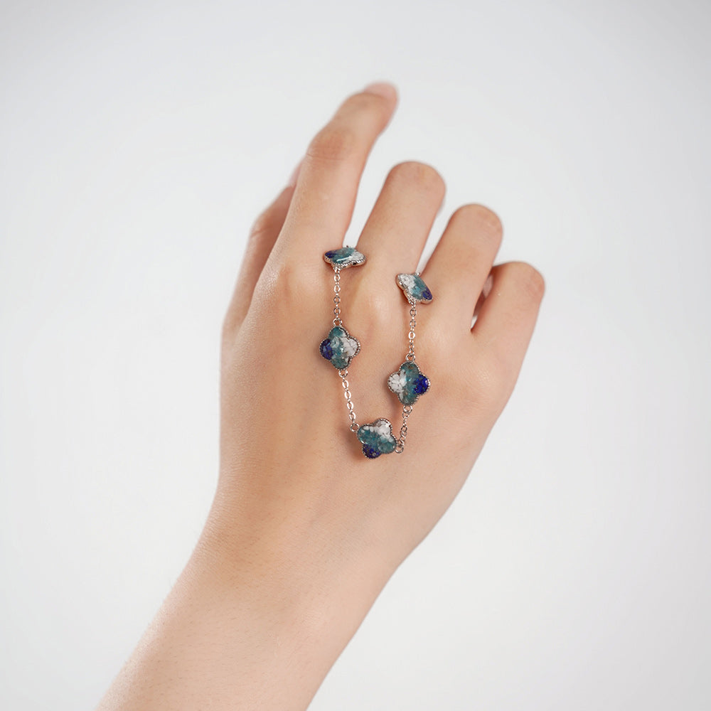 Silver Four-Leaf Clover Bracelet – Blue & White