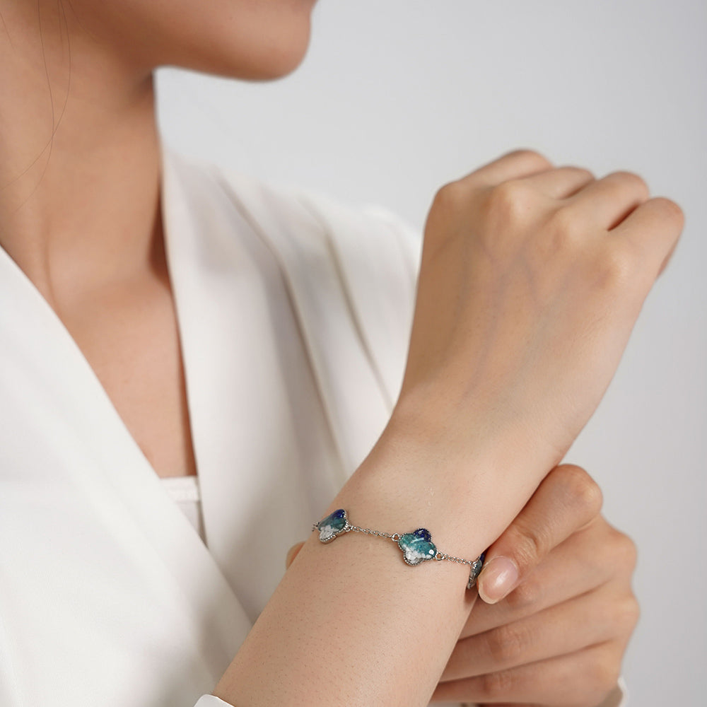 Silver Four-Leaf Clover Bracelet – Blue & White